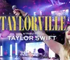 The image is a promotional poster for Taylorville a tribute event to Taylor Swift featuring a singer on stage with a microphone enthusiastic crowd and bold celebratory graphics